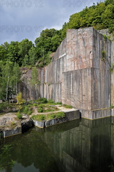 The abandoned red marble quarry Carriere de Beauchateau at Senzeilles in the Belgian Ardennes