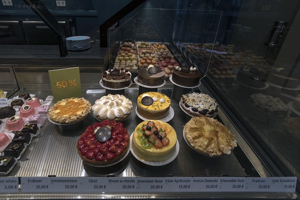 Various fruit cakes in a display in a confectionery