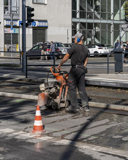 Road construction site next to a tram station