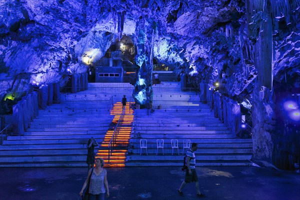 Visitors to St Michael's Cave