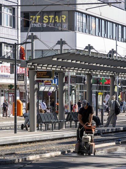 Road construction site next to a tram station