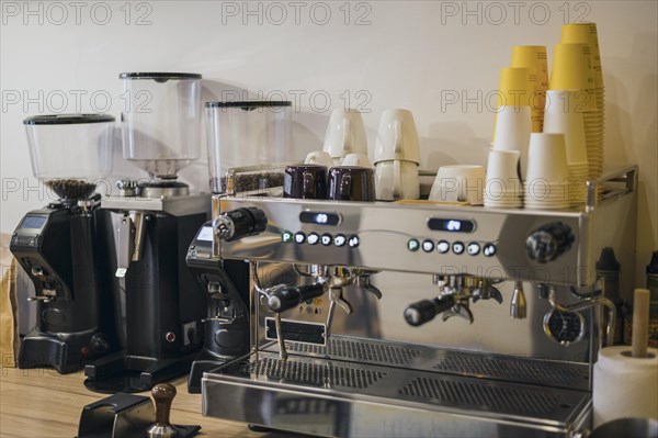 Front view coffee machine with loads cups