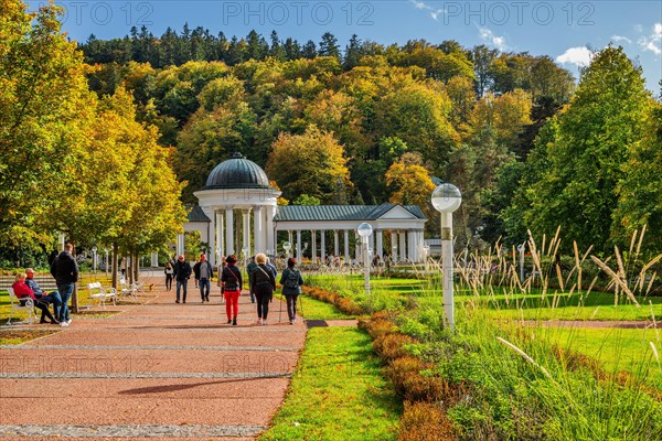 Spa promenade with Rudolph's Spring in the autumnal spa park
