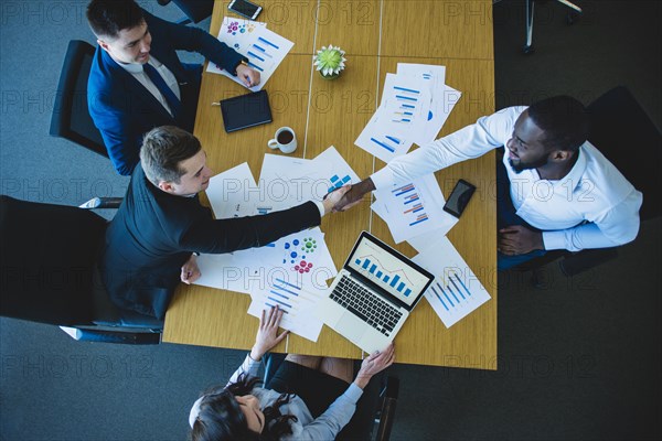 Business deal top view