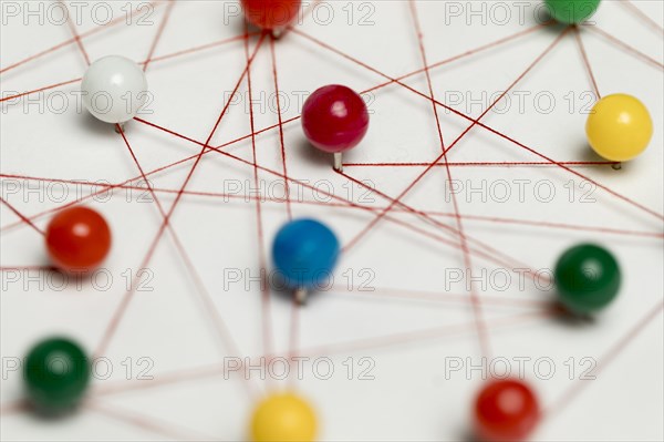Pushpin tracks thread close up