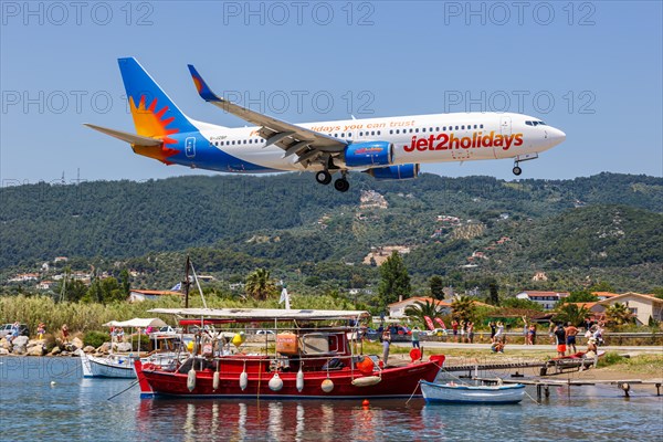 A Boeing 737-800 Jet2 aircraft with registration G-JZBP at Skiathos Airport