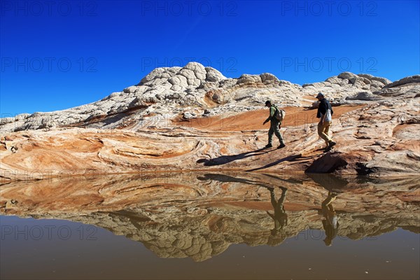Hiker in White Pocket Canyon