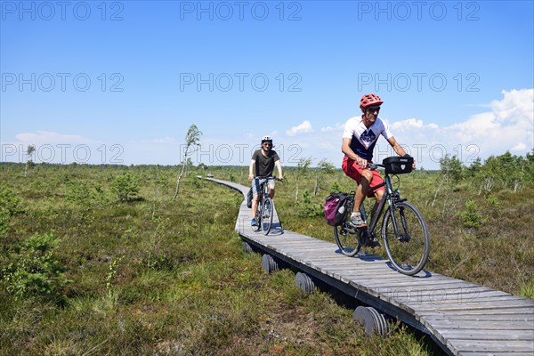 Cyclists on the Aukstumala Cognitive Path