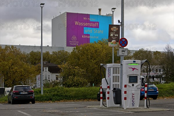 Charging station and large poster for climate steel at the ThyssenKrupp Steel Europe plant