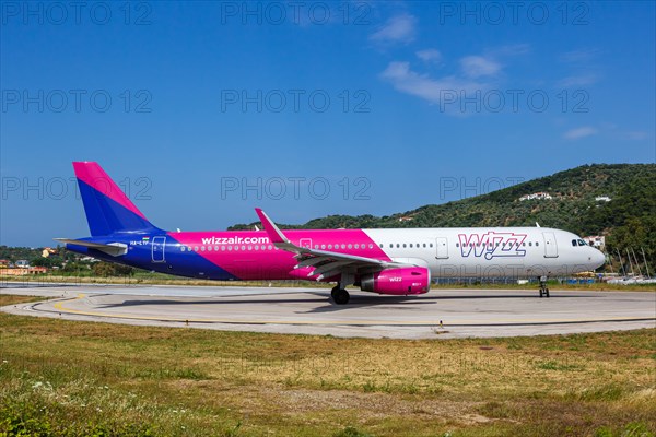 A Wizzair Airbus A321 aircraft with the registration HA-LTF at Skiathos Airport
