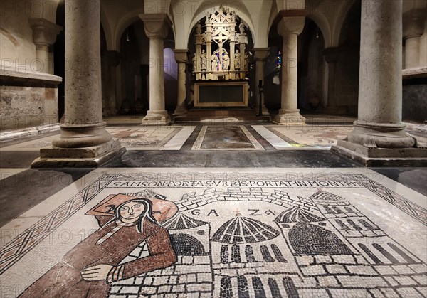 Medieval floor mosaic with Renaissance altar in the crypt
