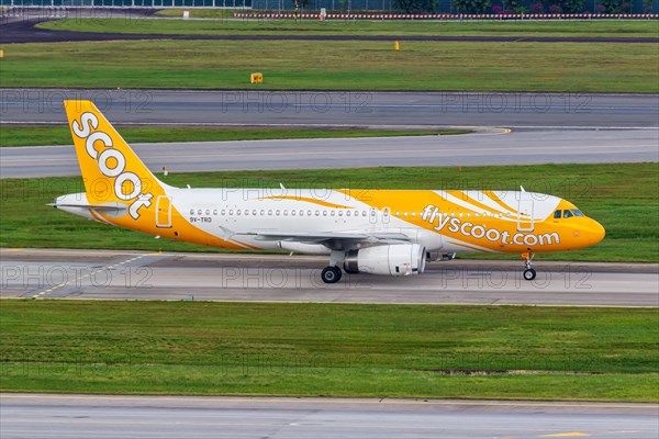A Scoot Airbus A320 aircraft with the registration 9V-TRD at Changi Airport