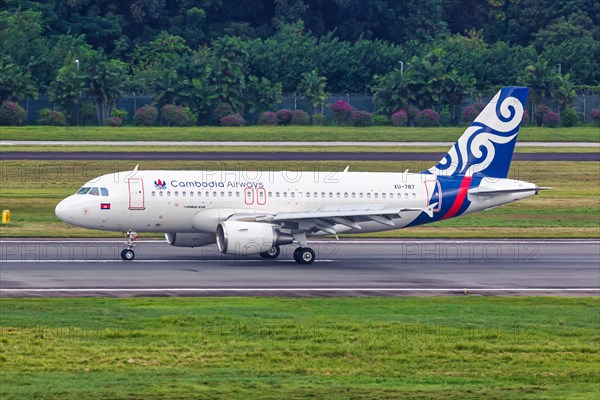 A Cambodia Airways Airbus A319 aircraft with the registration XU-787 at Changi Airport