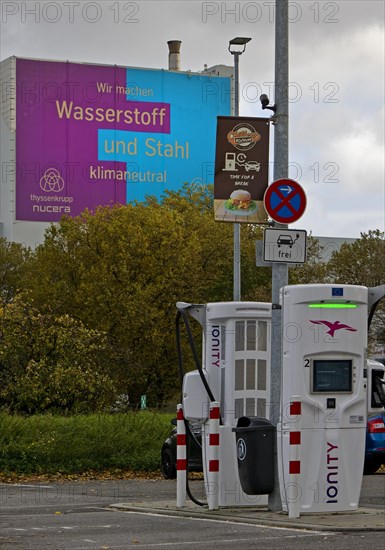 Charging station and large poster for climate steel at the ThyssenKrupp Steel Europe plant