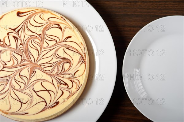 Fresh baked classic Cheese cake with chocolate topping
