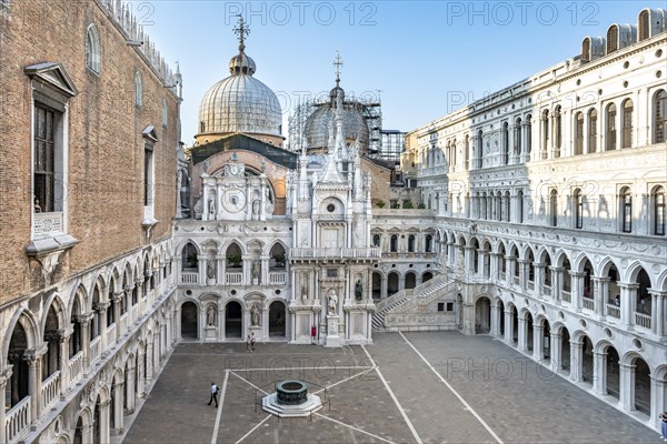View of the inner courtyard of the Doge's Palace with St Mark's Basilica and giant staircase