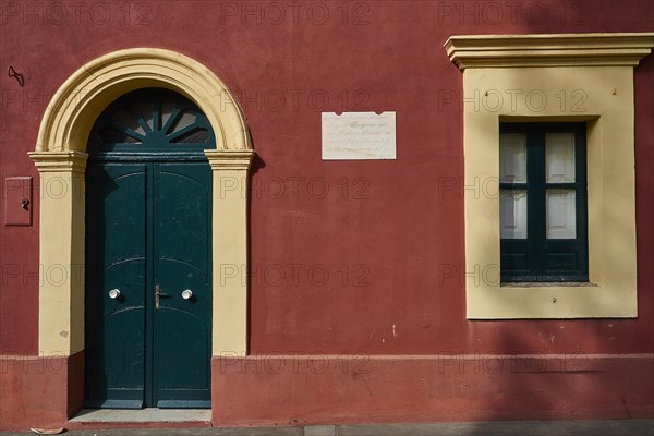 Red house wall