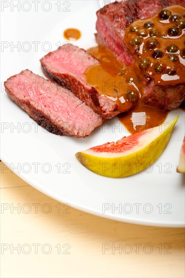 Beef filet mignon with green peppercorn creamy sauce ou poivre vert
