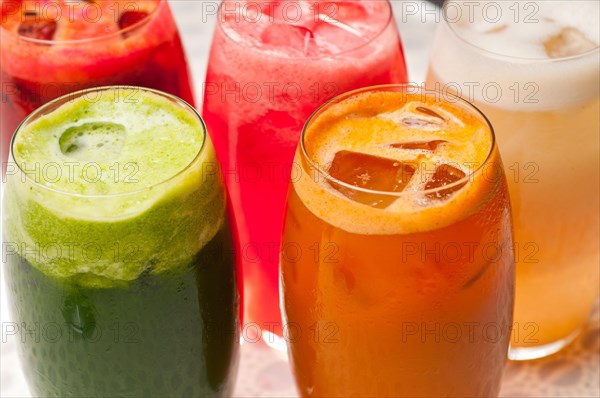 Selection of fresh fruits colorful long drink cocktails
