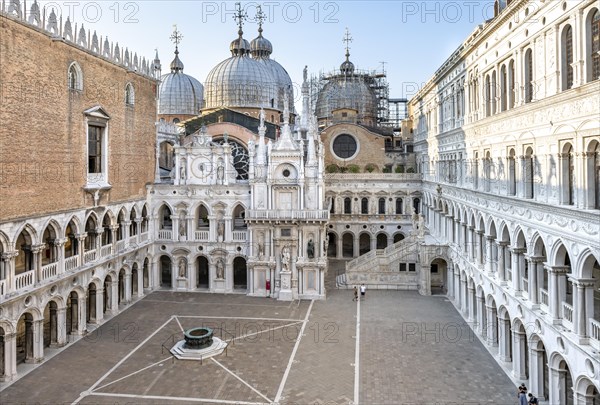 View of the inner courtyard of the Doge's Palace with St Mark's Basilica and giant staircase