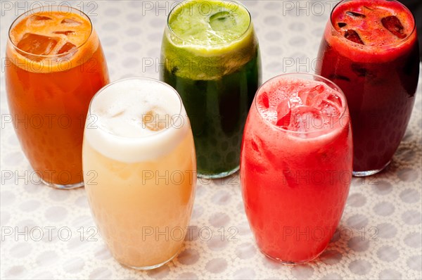 Selection of fresh fruits colorful long drink cocktails