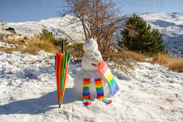 Snowman decorated with umbrella