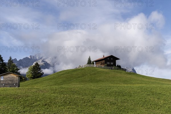 Hill with wooden house