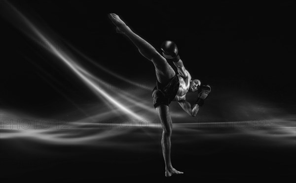 Black and white image of a mma fighter. Kickboxing concept. High quality