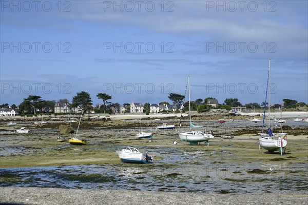 Harbour of Plouneour-Brignogan-Plage, boats lying on dry land at low tide, Finistere department,