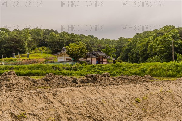 Daejeon, South Korea, May 22, 2018: Korean building with perimeter wall and ceramic tile roof in