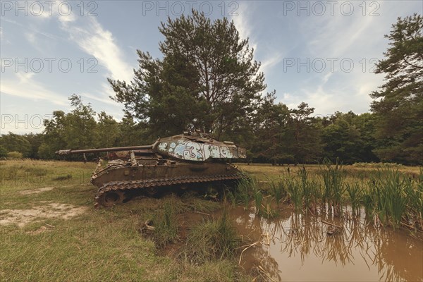 A tank by day at a pond, surrounded by trees and extensive nature, M41 Bulldog, Lost Place, Brander