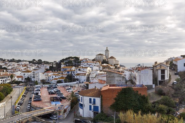 Local view, former fishing village of Cadaques with landmark, white church of Santa Maria,