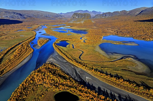 Aerial view of river delta with mountains in autumn, Rapadalen and Nammatj, Laponia, Lapland,