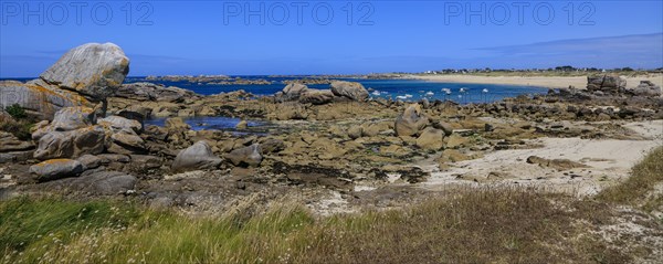 Granite rock formations on the beach of the English Channel near the village of Meneham, Menez Ham,