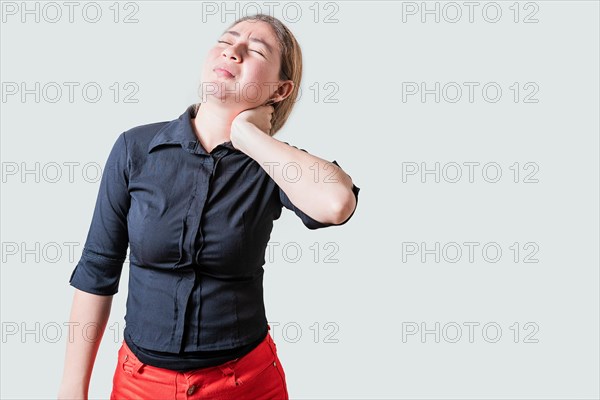 Young woman with muscle tension and neck pain isolated. Stress and neck pain concept, Girl