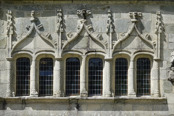 Window of the ossuary from the 16th century, Enclos Paroissial de Pleyben, Finistere department,