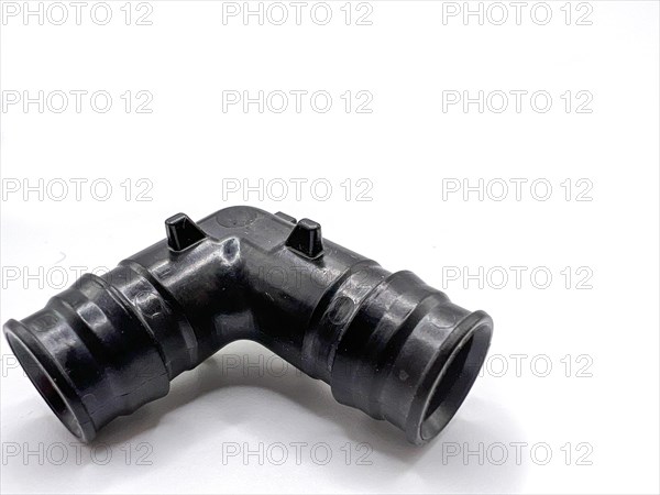Black PVC pipe fittings isolated on white background. Black plastic water pipe. PVC accessories for