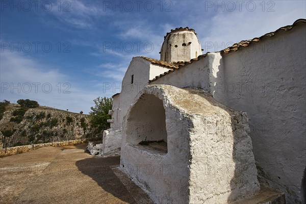 Church of St Michael the Archangel, cross-domed church, side view of a white church with clear blue