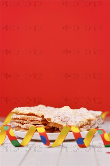 Fried Italian dessert snack for carnival season called 'Galani', ' Chiacchiere' or 'Crostoli' in