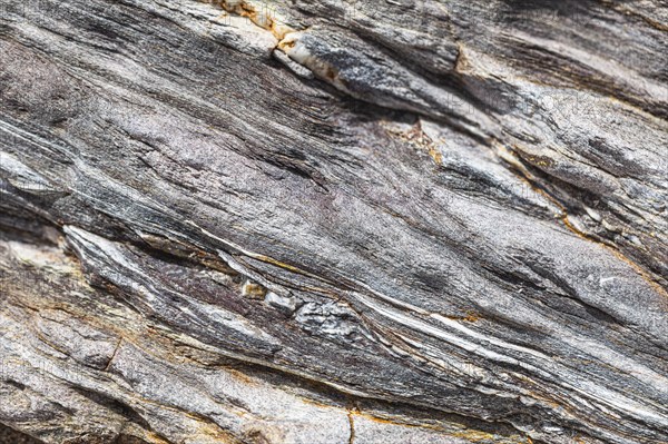 Coloured, ferrous mineral rocks on the beach of Topinetti, near Rio Marina, Elba, Tuscan