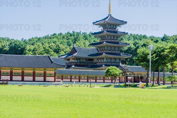 Buyeo, South Korea, July 7, 2018: Main gate of Neungsa Baekje Temple with golden spire on top of