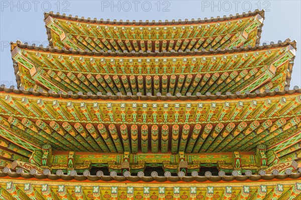 Buyeo, South Korea, July 7, 2018: Eves of colorful Buddhist five story pagoda at Neungsa Baekje