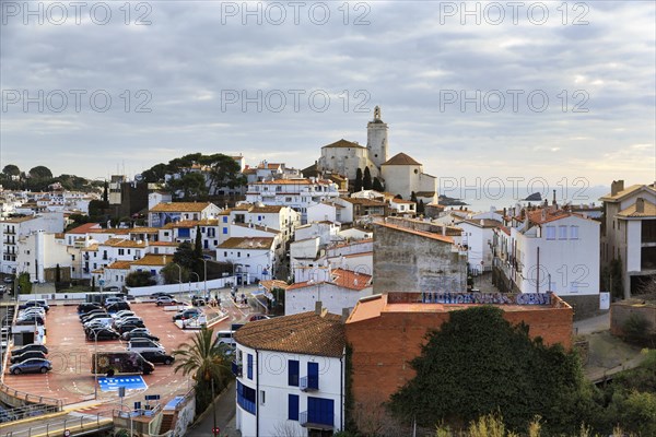 Local view, former fishing village of Cadaques with landmark, white church of Santa Maria,