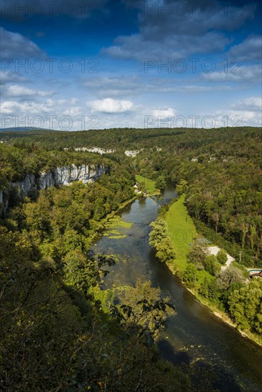 River with gorge and autumnal coloured forest, valley of the Loue, Lizine, near Besancon,