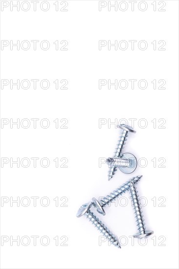 Various screws isolated on white background. Image of screws on isolated background. Concept of