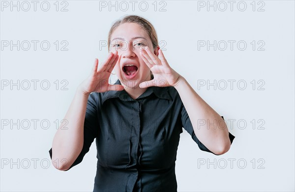 Female teenager announcing something to the camera. Young girl screaming and announcing at the