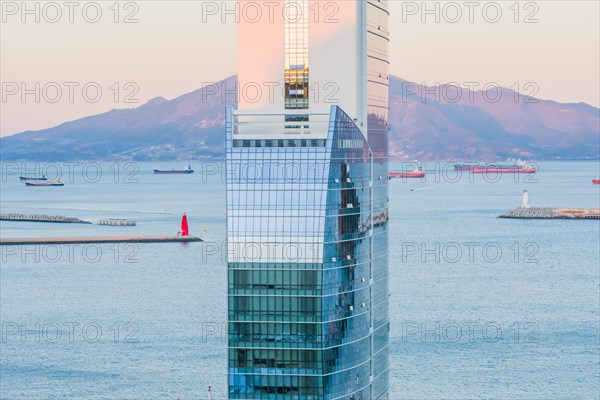 Yeoso, South Korea: December 25, 2017: Top of the MVL hotel with mountains and the harbor full of