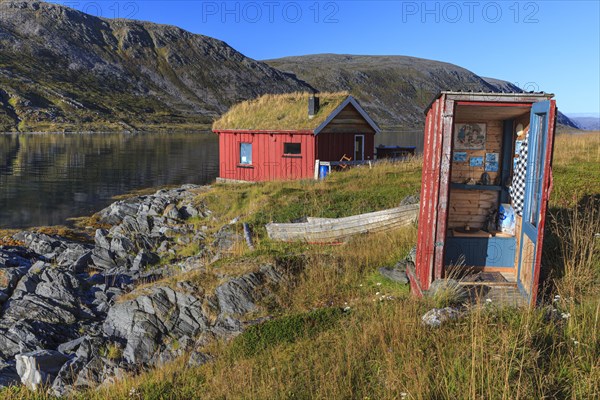 Rorbuer with toilet (outhouse) on the fjord off Bergen, summer, Nordkinn Peninsula, Finnmark,