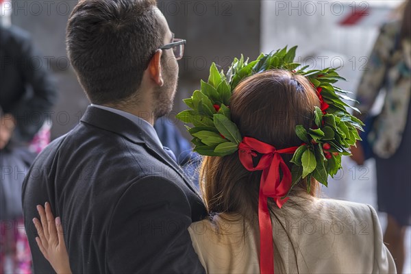 Graduate of the University of Genoa with traditional laurel wreath and red ribbon, Genoa, Italy,