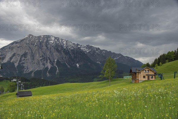 Summer austrian landscape with Grimming mountain (2.351 m), an isolated peak in the Dachstein